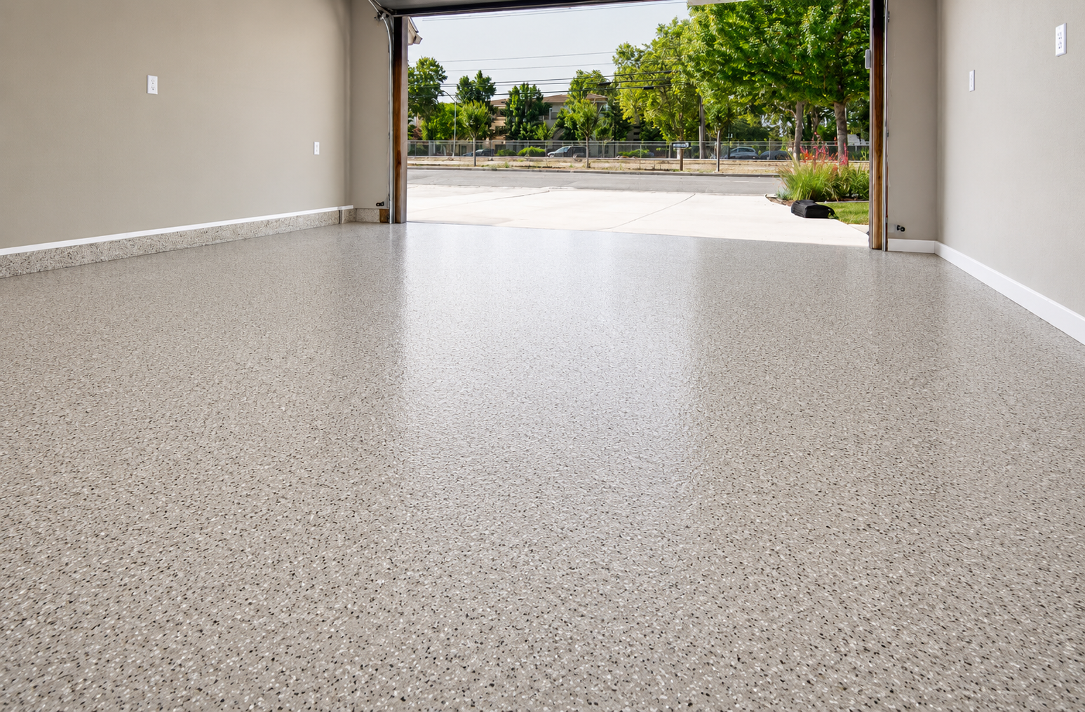 Garage with open door showing epoxy floor